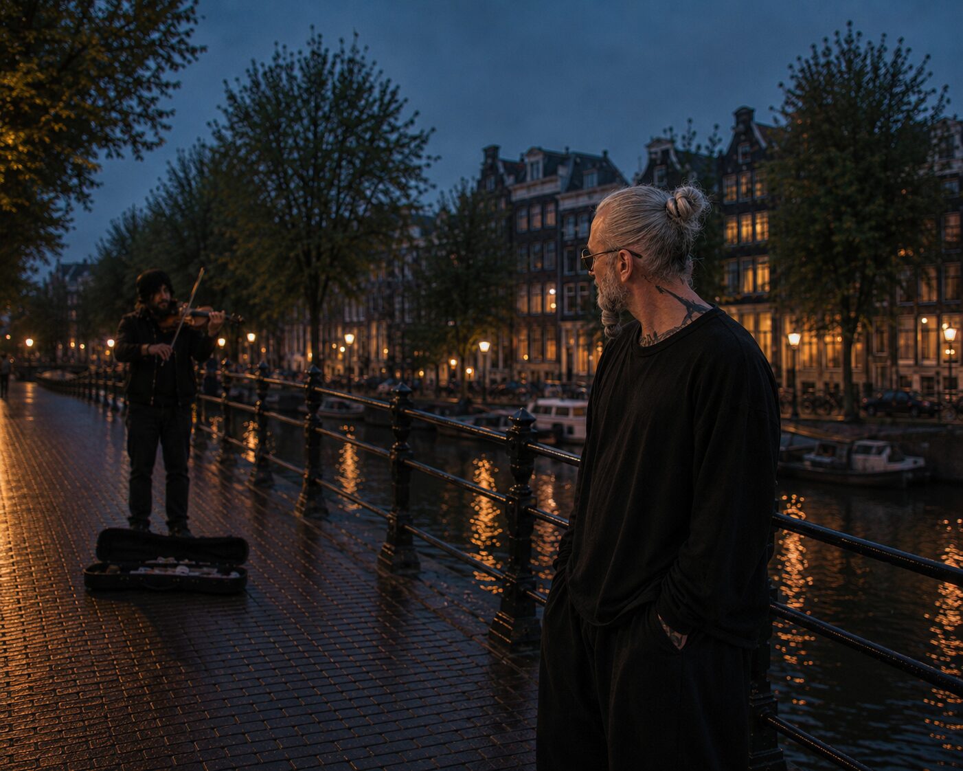 Marcel Smet watching a street violinist play on an Amsterdam canal bridge at dusk